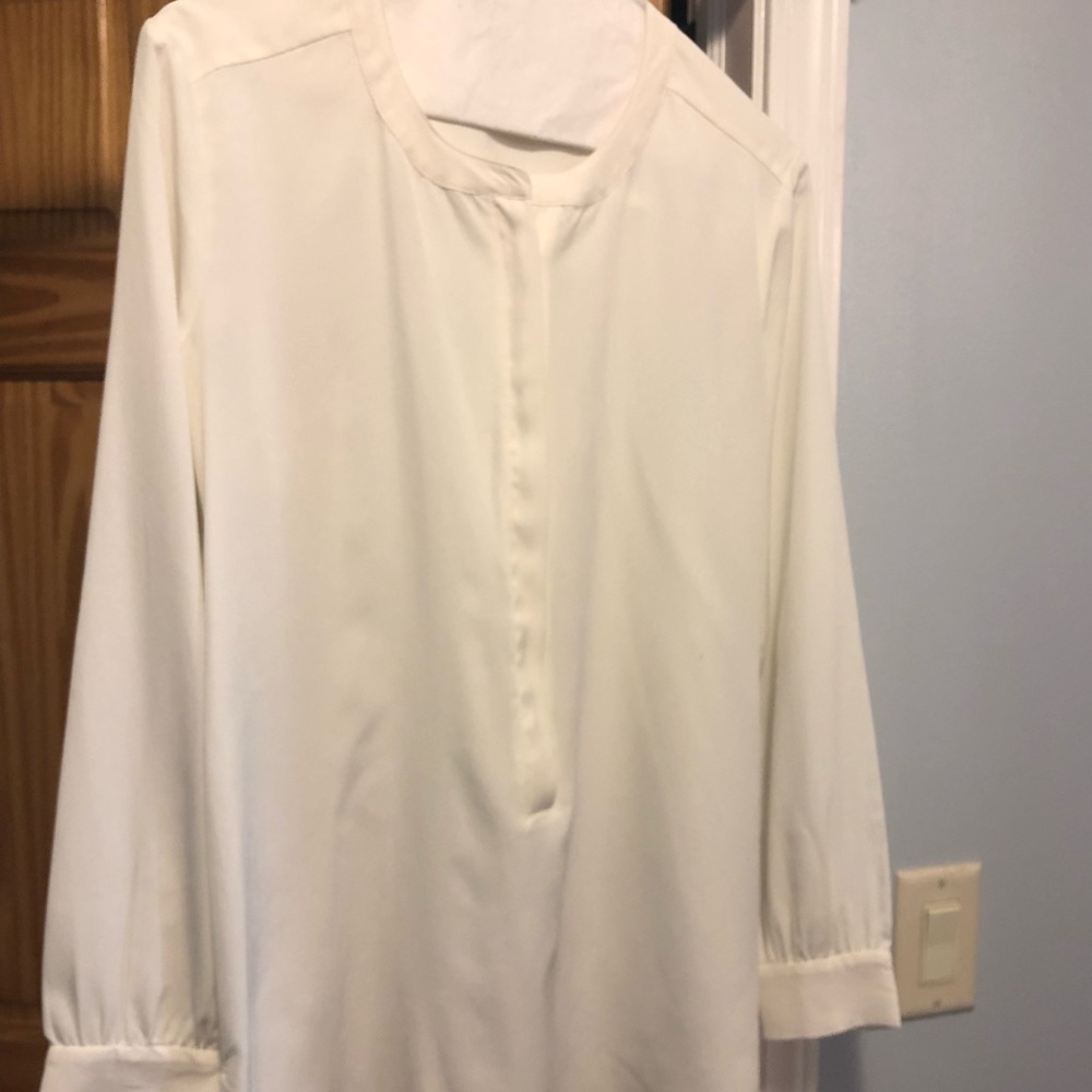 Off white Blouse. UEC, smoke free home.